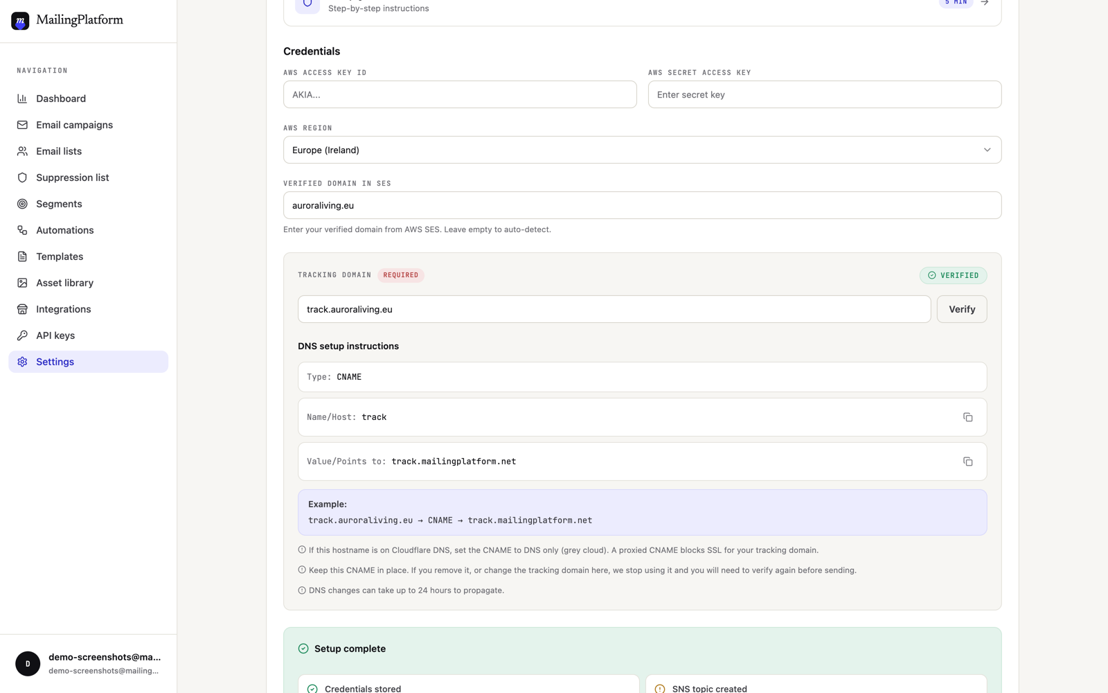 Domain setup in MailingPlatform settings: the exact CNAME record to add, a copy button per value, and a verified badge on the tracking domain